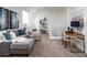 Bright loft with sectional sofa, work area, and stylish decor at 4050 N 12Th St # 1, Phoenix, AZ 85014