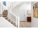Modern staircase with metal railings, leading to the upper level at 4050 N 12Th St # 1, Phoenix, AZ 85014