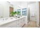 Double vanity bathroom with a walk-in shower at 4050 N 12Th St # 3, Phoenix, AZ 85014