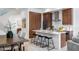 Modern kitchen with island, breakfast bar and stainless steel appliances at 4050 N 12Th St # 3, Phoenix, AZ 85014