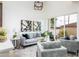 Spacious living area with access to a private patio and large windows at 4050 N 12Th St # 3, Phoenix, AZ 85014
