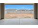 Unfinished backyard with block fence, showcasing the potential for landscaping and outdoor living at 44713 N 44Th Dr, Phoenix, AZ 85087