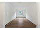 Empty bedroom with neutral walls, wood-look tile floor and a window at 44713 N 44Th Dr, Phoenix, AZ 85087