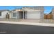 Inviting single-story home with stone veneer, neutral siding, and a well-manicured front yard at 44713 N 44Th Dr, Phoenix, AZ 85087