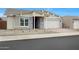 Lovely single-level home showcasing stone detailing, a quaint porch, and desert-friendly landscaping at 44713 N 44Th Dr, Phoenix, AZ 85087