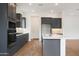 Well-designed kitchen with an island, stainless steel appliances, and ample cabinet space at 44713 N 44Th Dr, Phoenix, AZ 85087