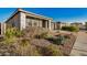 House exterior with gray siding, landscaping, and a paved walkway at 4609 S Element --, Mesa, AZ 85212