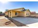 House exterior showcasing backyard patio and gravel landscaping at 12640 W Florence St, Avondale, AZ 85323