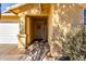 Front door entry with a welcome sign and walkway at 12640 W Florence St, Avondale, AZ 85323