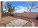 Backyard with grassy area and brick border at 15829 W Carmen Dr, Surprise, AZ 85374