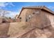 Backyard view of home's exterior and patio at 15829 W Carmen Dr, Surprise, AZ 85374