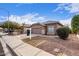 House exterior showcasing a front yard and driveway at 15829 W Carmen Dr, Surprise, AZ 85374