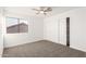 Spacious bedroom featuring ample closet space and carpeting at 16442 N 59Th Pl, Scottsdale, AZ 85254