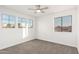 Spacious bedroom with multiple windows and carpet floors at 16442 N 59Th Pl, Scottsdale, AZ 85254