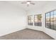 Bedroom with large windows and neutral carpeting at 16442 N 59Th Pl, Scottsdale, AZ 85254