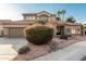 Beautiful two-story home with a landscaped front yard at 16442 N 59Th Pl, Scottsdale, AZ 85254