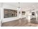 Bright kitchen with white cabinets, quartz countertops, and stainless steel appliances at 16442 N 59Th Pl, Scottsdale, AZ 85254