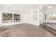 Spacious living room featuring wood-look tile floors at 16442 N 59Th Pl, Scottsdale, AZ 85254