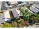 An aerial view of a home with neutral tones and mature landscaping in a suburban neighborhood at 1778 S Saddle St, Gilbert, AZ 85233
