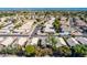 Aerial view showcases homes with desert landscaping in a well-maintained community at 1778 S Saddle St, Gilbert, AZ 85233