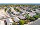 A scenic aerial shot shows a well-maintained residential community with desert landscaping at 1778 S Saddle St, Gilbert, AZ 85233