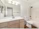 Bright bathroom featuring a bathtub and shower combination, toilet and sink at 1778 S Saddle St, Gilbert, AZ 85233