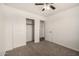 Neutral bedroom with a closet and doorway with wood look flooring at 1778 S Saddle St, Gilbert, AZ 85233