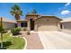 Charming single-Gathering home featuring a well-manicured front yard and a two-car garage at 1778 S Saddle St, Gilbert, AZ 85233
