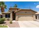 Inviting single-Gathering home showcasing a desert landscape, private entrance, and attached garage at 1778 S Saddle St, Gilbert, AZ 85233