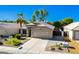 Beautiful home showcasing desert landscaping, driveway, and garage at 1778 S Saddle St, Gilbert, AZ 85233