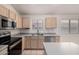 The kitchen features modern appliances, ample counter space, and bright natural lighting at 1778 S Saddle St, Gilbert, AZ 85233