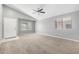 Inviting living room with neutral paint, plush carpet, and ample natural light at 1778 S Saddle St, Gilbert, AZ 85233