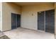 Covered patio with two sliding glass doors leading inside at 1778 S Saddle St, Gilbert, AZ 85233