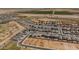 Aerial view of new homes under construction in a large community at 35907 W San Clemente Ave, Maricopa, AZ 85138