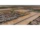 Aerial view of a new housing development with many new homes at 35907 W San Clemente Ave, Maricopa, AZ 85138