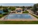 Community basketball court next to a lake and playground at 35907 W San Clemente Ave, Maricopa, AZ 85138