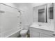 Bathroom with bathtub and white vanity at 35907 W San Clemente Ave, Maricopa, AZ 85138