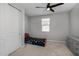 bedroom with twin bed and dresser at 35907 W San Clemente Ave, Maricopa, AZ 85138