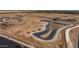 Aerial view of a community pond under construction at 35907 W San Clemente Ave, Maricopa, AZ 85138