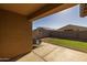 Relaxing patio with seating area and fire pit at 35907 W San Clemente Ave, Maricopa, AZ 85138