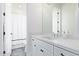 Modern bathroom with white cabinets and quartz countertops at 3901 E Sagebrush St, Gilbert, AZ 85296