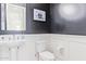 Elegant powder room with white pedestal sink and dark wall accents at 3901 E Sagebrush St, Gilbert, AZ 85296