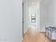 Light and airy hallway with wood floors at 3901 E Sagebrush St, Gilbert, AZ 85296