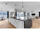 Modern kitchen with a large island and white cabinetry at 3901 E Sagebrush St, Gilbert, AZ 85296