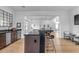 Modern kitchen with dark cabinetry, quartz countertops, and stainless steel appliances at 3901 E Sagebrush St, Gilbert, AZ 85296