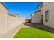 Side yard with artificial turf and gravel landscaping at 3901 E Sagebrush St, Gilbert, AZ 85296