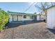 Backyard with covered patio, and gravel landscaping at 6908 E Windsor Ave, Scottsdale, AZ 85257