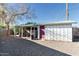 Backyard with covered patio, storage shed, and gravel landscaping at 6908 E Windsor Ave, Scottsdale, AZ 85257