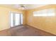 Charming bedroom with french doors and ceiling fan at 6908 E Windsor Ave, Scottsdale, AZ 85257