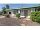 House exterior featuring a covered porch and landscaping at 6908 E Windsor Ave, Scottsdale, AZ 85257